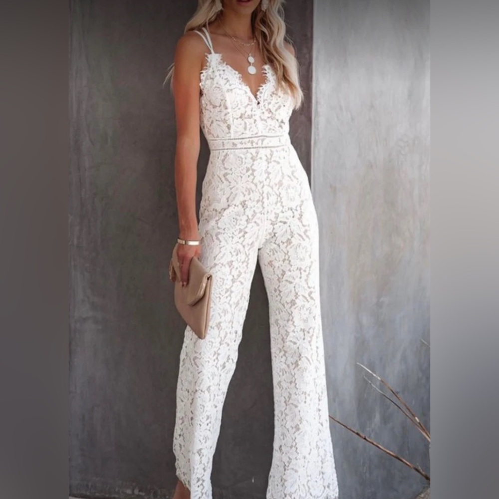Aakaa white lace jumpsuit purchased from vici, NWT